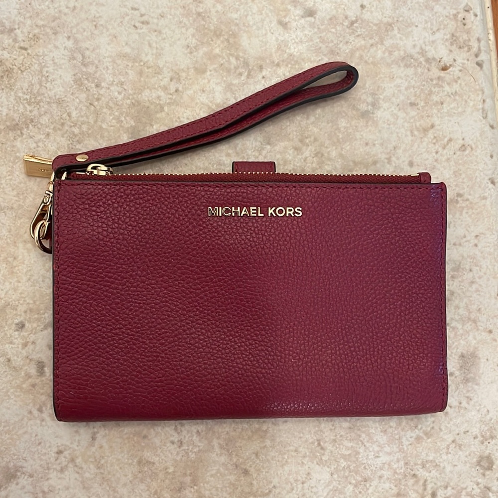 Michael Kors burgundy wallet/wristlet